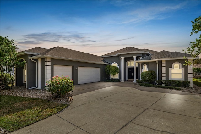 prairie-style home with a garage