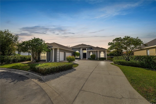 ranch-style house featuring a garage