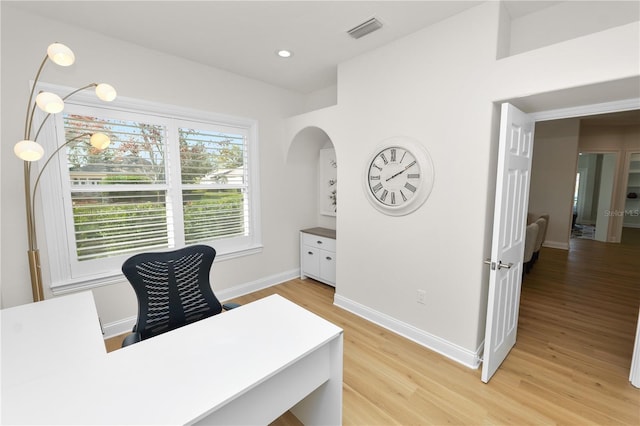 home office featuring light wood-type flooring