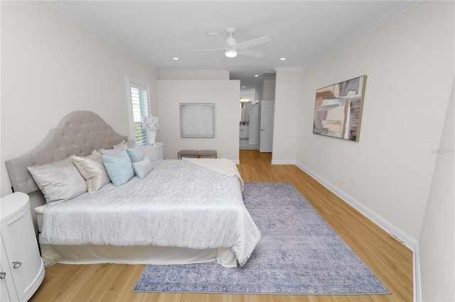 bedroom with crown molding, ceiling fan, and light wood-type flooring