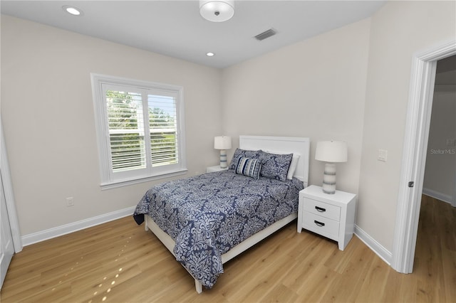 bedroom featuring light hardwood / wood-style flooring