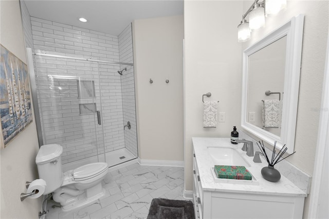 bathroom featuring vanity, an enclosed shower, and toilet