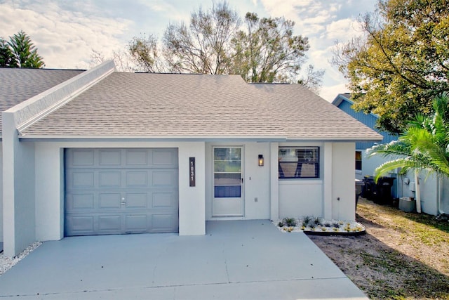 ranch-style house featuring a garage