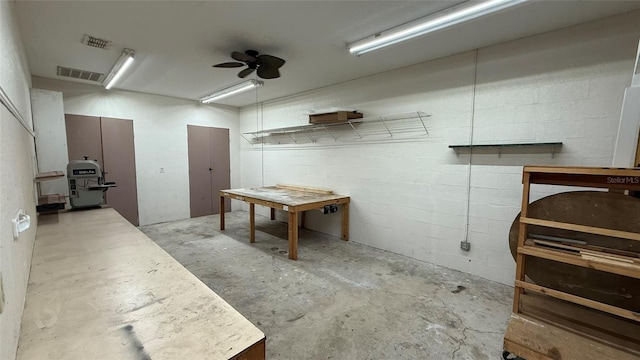 basement featuring ceiling fan