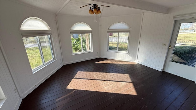 interior space with ceiling fan and vaulted ceiling