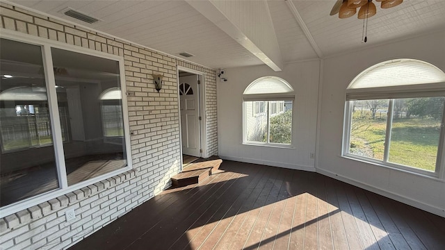 sunroom / solarium with beamed ceiling and ceiling fan