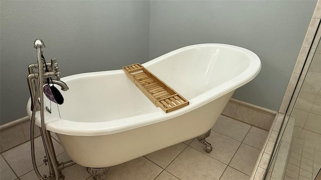 bathroom featuring a bathtub and tile patterned floors