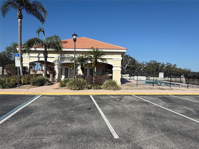 view of property with a community pool