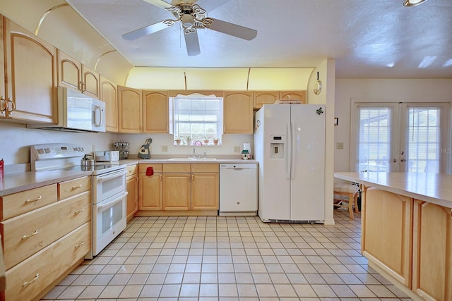 kitchen with french doors, sink, light brown cabinets, ceiling fan, and white appliances