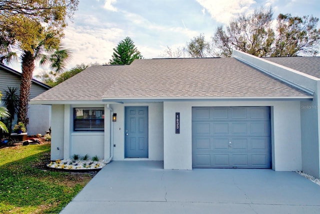 single story home with a garage