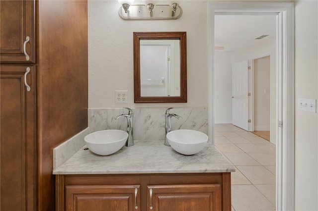 bathroom with vanity and tile patterned floors