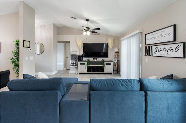 tiled living room featuring lofted ceiling and ceiling fan