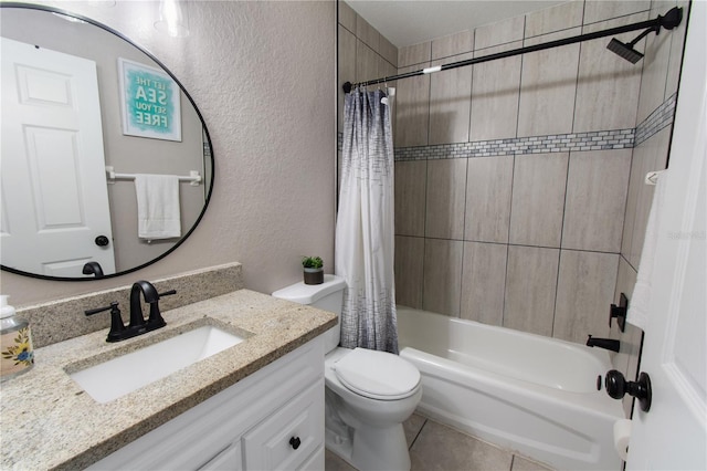 full bathroom featuring vanity, shower / bath combo, tile patterned floors, and toilet