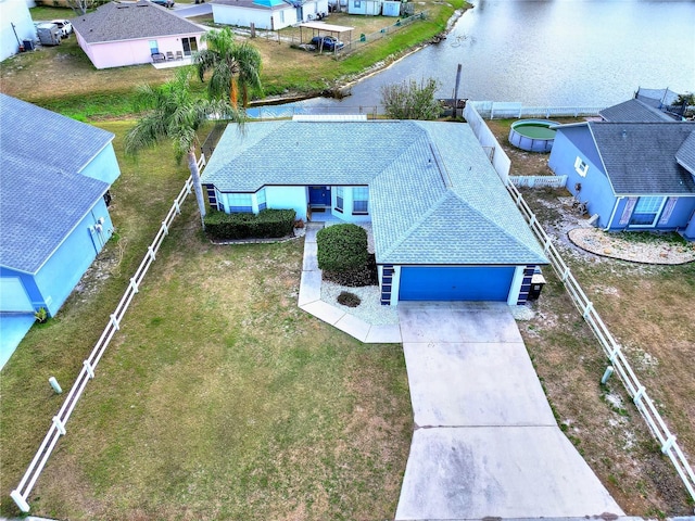 drone / aerial view with a water view