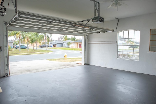 garage featuring a garage door opener