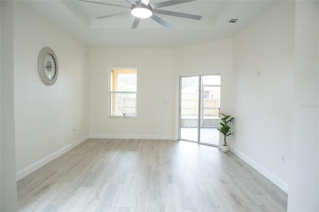 unfurnished room featuring ceiling fan and light wood-type flooring