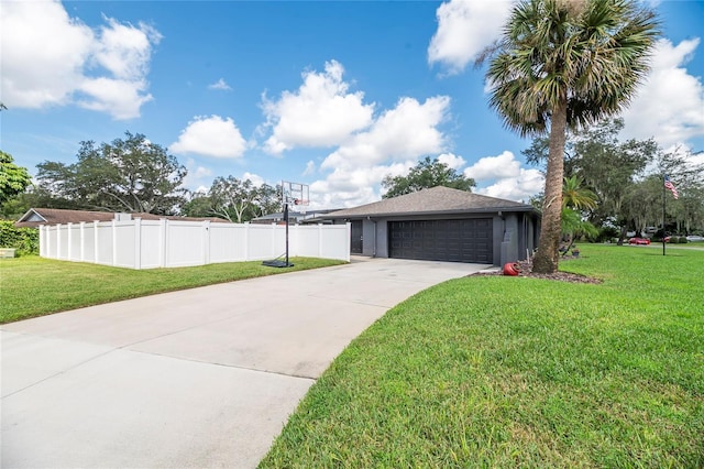 view of front of property with a garage and a front yard