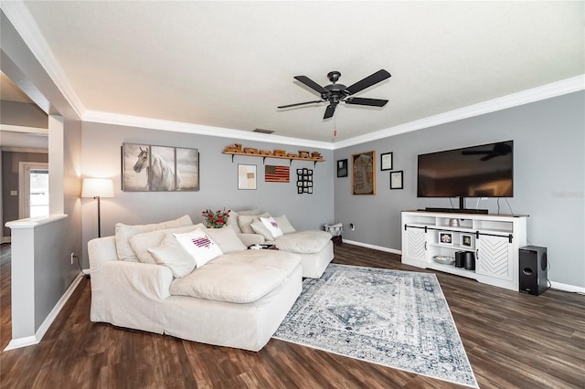 living room with ceiling fan, ornamental molding, and dark hardwood / wood-style flooring