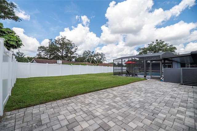 view of patio / terrace with glass enclosure