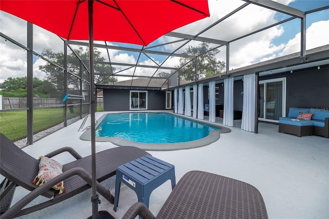 view of swimming pool featuring an outdoor living space, a patio, a lanai, and a yard