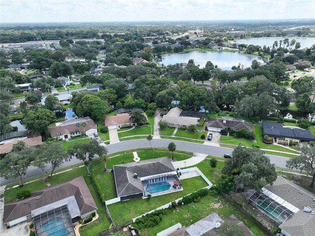 birds eye view of property featuring a water view