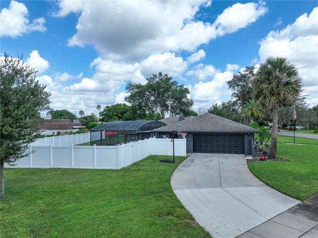 view of front of property with a garage, a front lawn, and glass enclosure