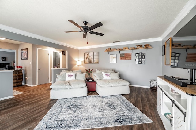 living room featuring baseboards, ceiling fan, dark wood-style flooring, and crown molding