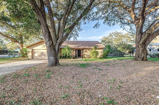 single story home with a garage