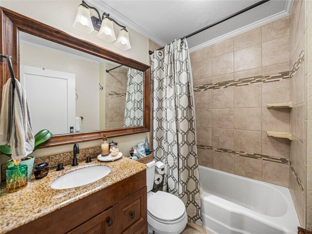 full bathroom featuring shower / tub combo with curtain, ornamental molding, toilet, and vanity