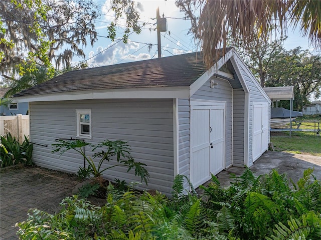 view of outdoor structure with a garage