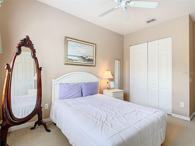 205 Terrace Ridge Cir Unit 205, Davenport, FL 33896 - carpeted bedroom with ceiling fan and a closet