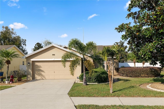 single story home with a garage and a front yard