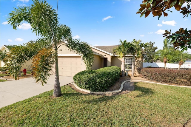 view of front facade featuring a garage and a front yard