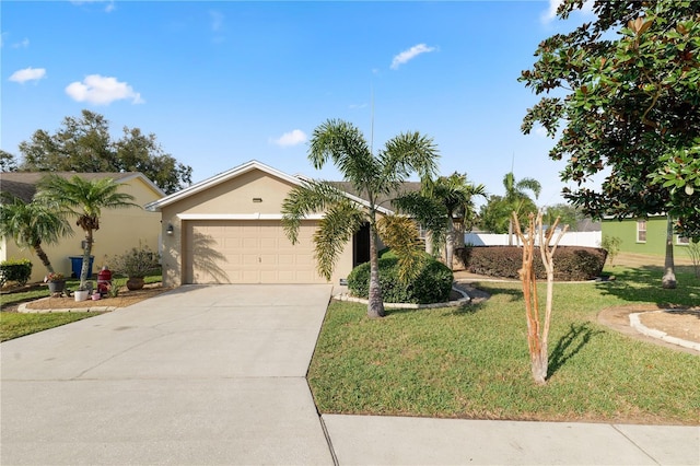 view of front of house featuring a garage and a front yard