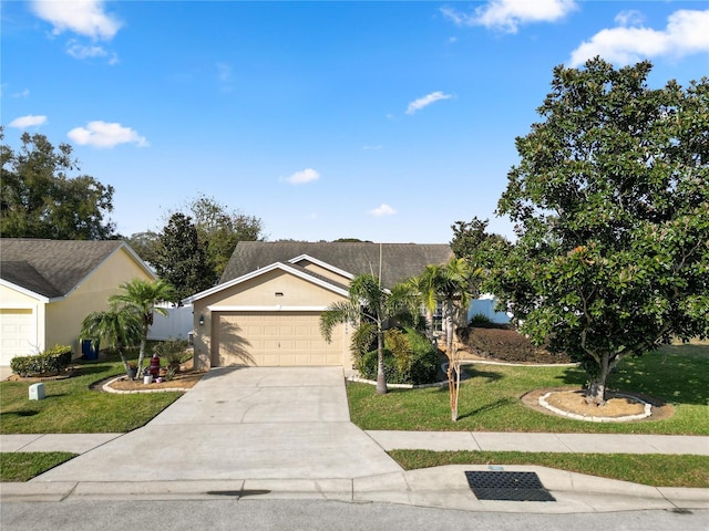 ranch-style house with a garage and a front yard