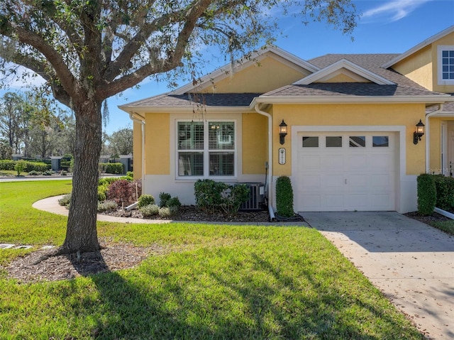 single story home featuring a garage, a front yard, and central AC unit