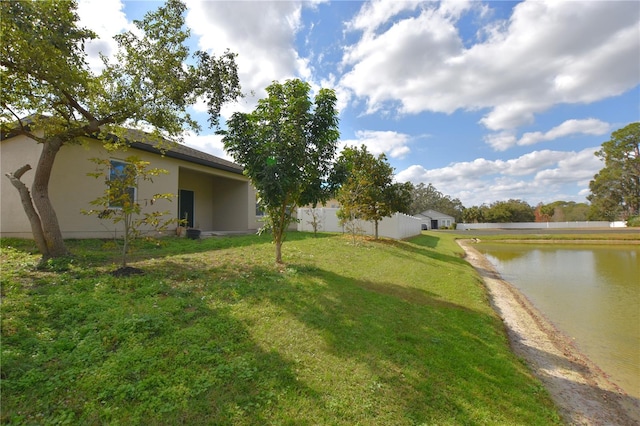 view of yard with a water view