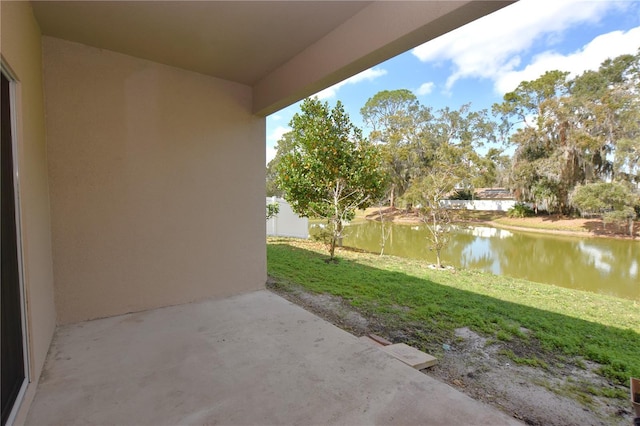 view of patio / terrace with a water view