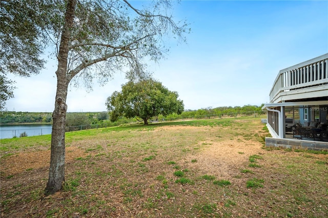 view of yard with a water view