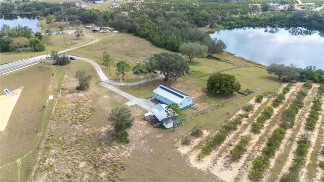 aerial view featuring a water view and a rural view