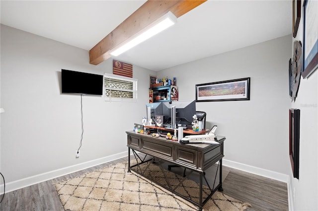 office space featuring hardwood / wood-style floors and beam ceiling