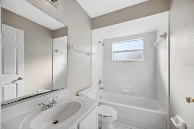 full bathroom with vanity, tiled shower / bath combo, and toilet