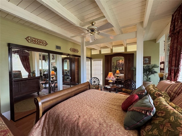 bedroom featuring wood-type flooring, wooden ceiling, and beamed ceiling