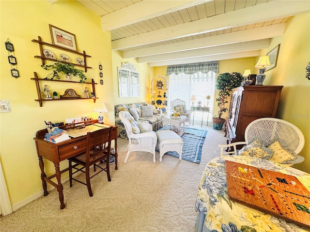 living area with beamed ceiling, wood ceiling, and carpet floors