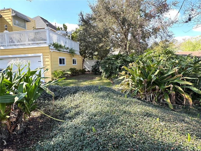 view of yard with an attached garage