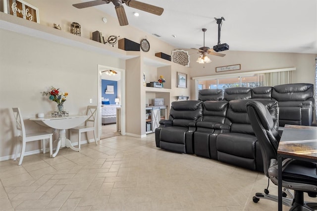 cinema room featuring vaulted ceiling and ceiling fan