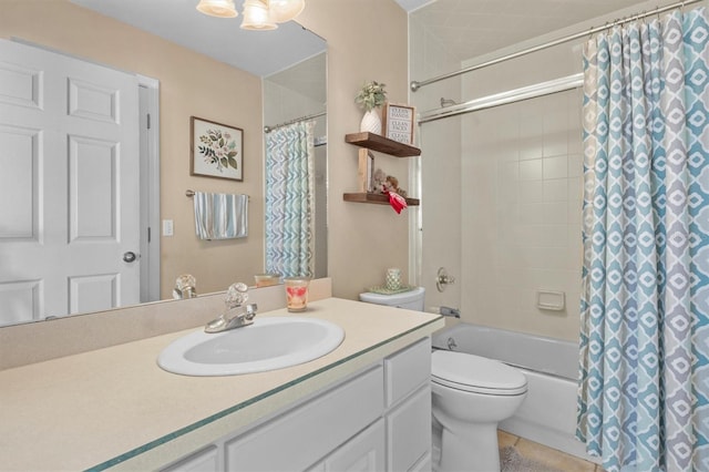 full bathroom with tile patterned floors, toilet, vanity, and shower / bath combo