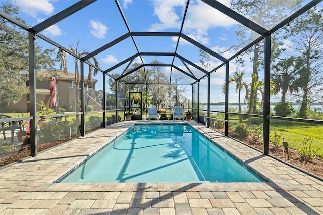 pool with a patio and a lanai