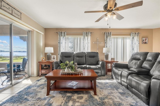 living room with tile patterned flooring and ceiling fan