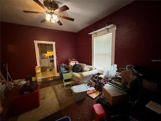 carpeted bedroom with ceiling fan